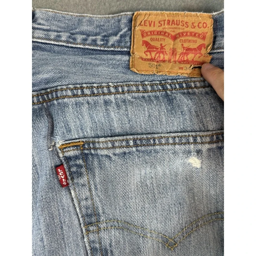 VTG Levis 501 Jeans Mens 34x34 Light Wash Blue Regular Straight Distressed Denim